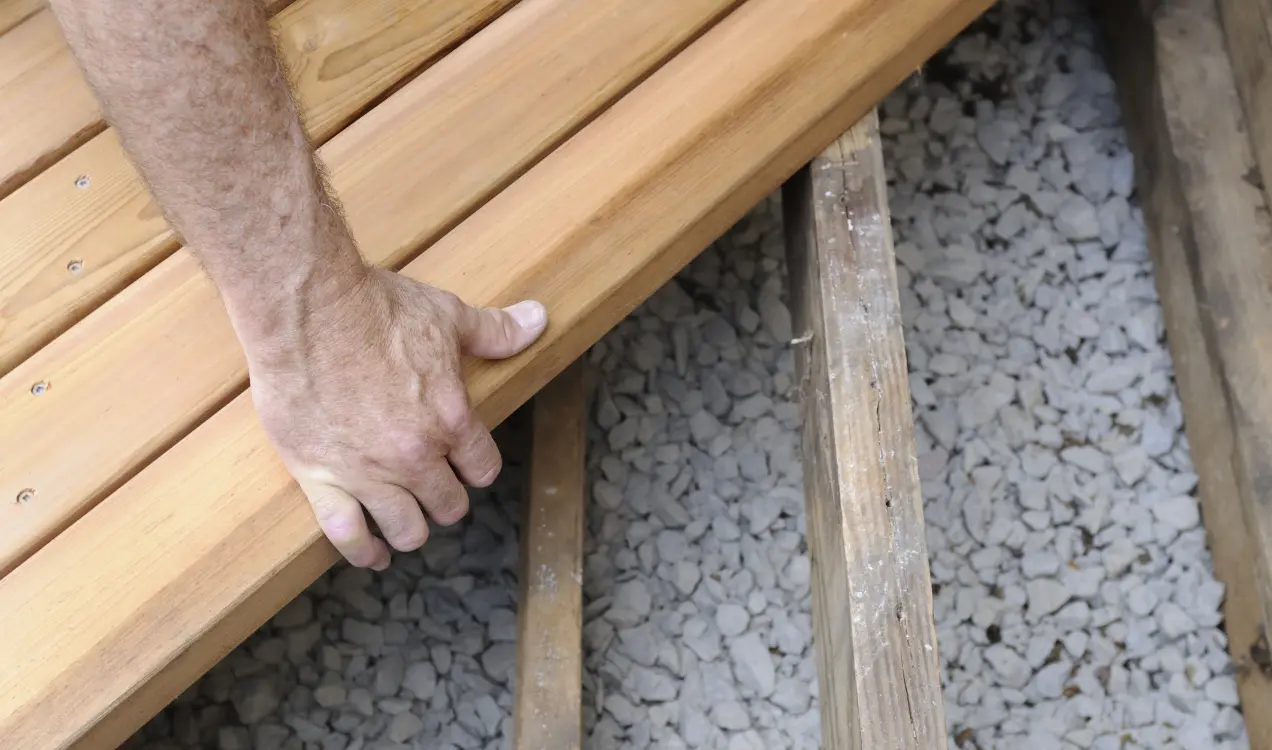 Wood boards of a deck being placed by contractors from Schneider Construction in Central Illinois