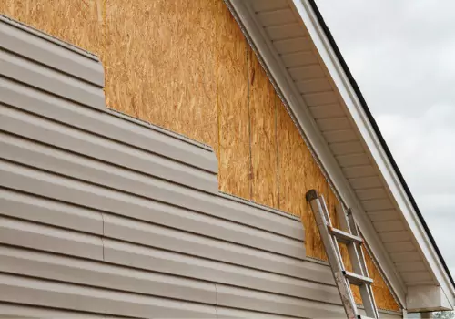 Siding being installed on a home in Peoria IL