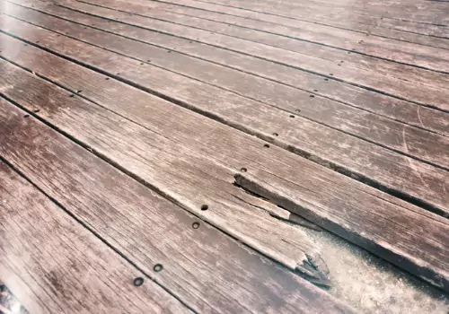 A Deck that is broken and rotting, requiring deck repair in Peoria IL