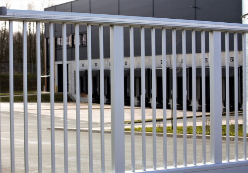 Aluminum commercial fencing installed by Schneider Construction